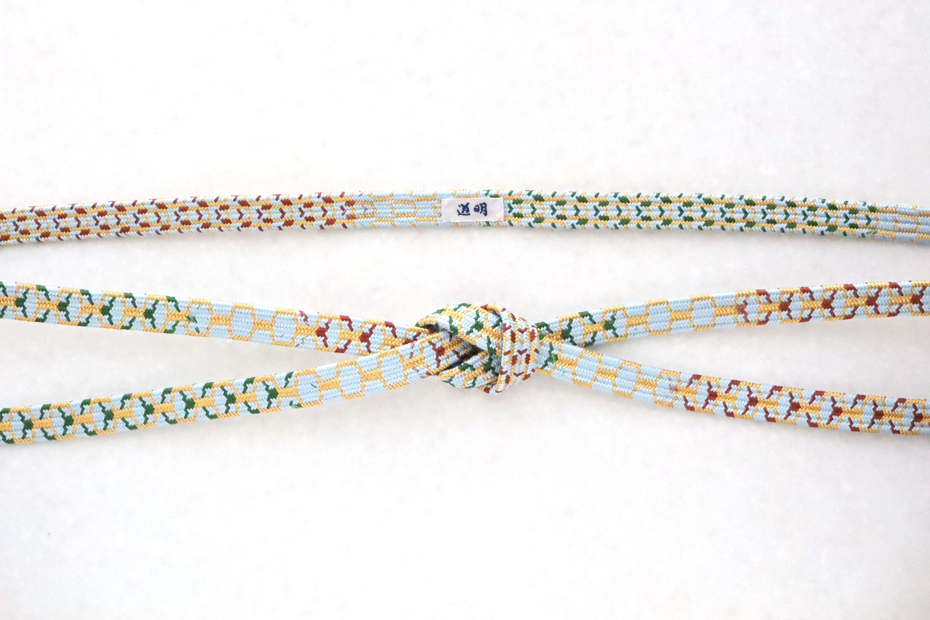 亀甲組「亀甲鶴文様打掛」〈帯締め〉 – 有職組紐 道明